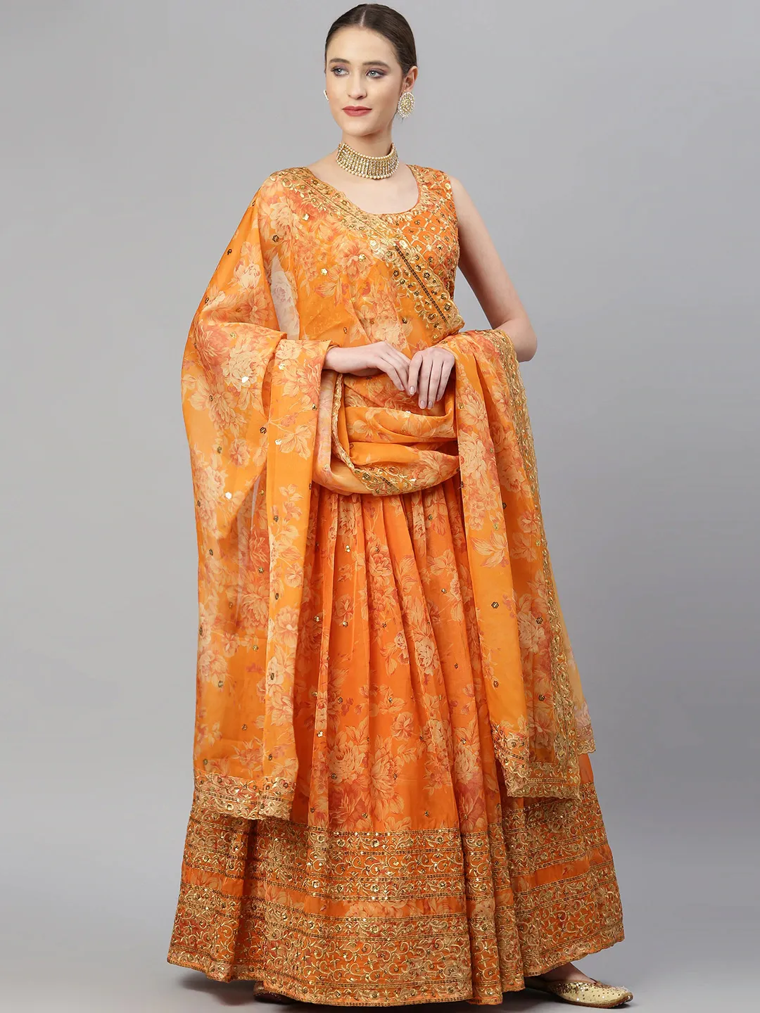Orange Lehenga Choli Set Canada with floral design, embellished skirt, and dupatta, perfect for weddings and festive occasions