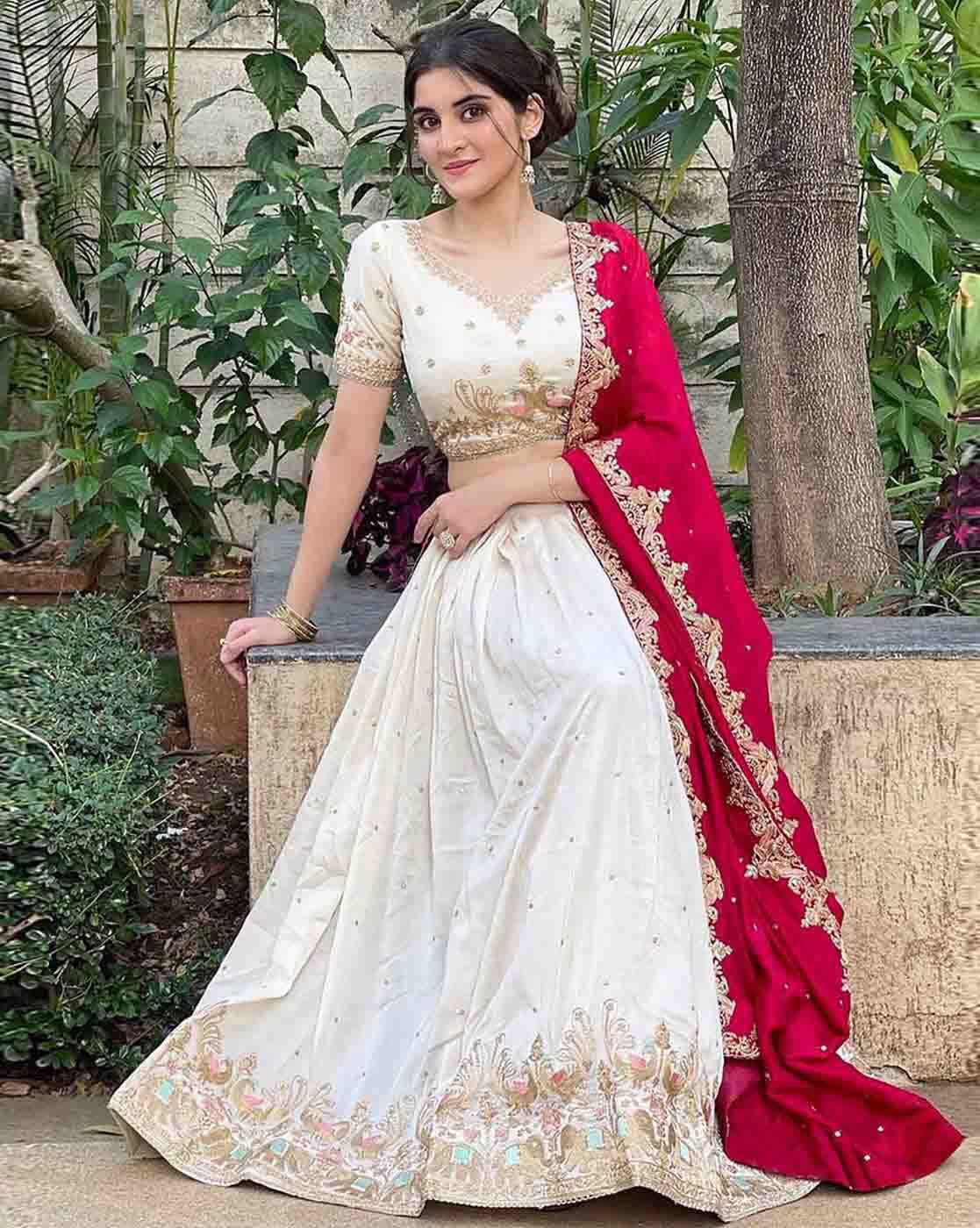 Elegant lehenga choli set Canada in white and red, designed with intricate embroidery for festive occasions