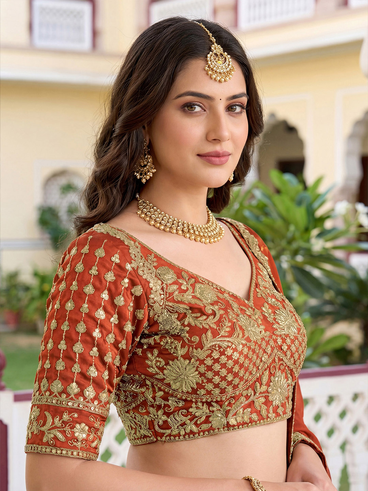 Elegant orange lehenga choli set USA with intricate embroidery, perfect for weddings and festive occasions