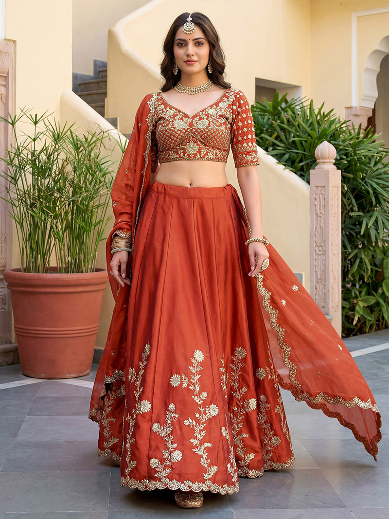Rust-colored lehenga choli set USA with detailed embroidery, perfect for weddings and festive occasions.