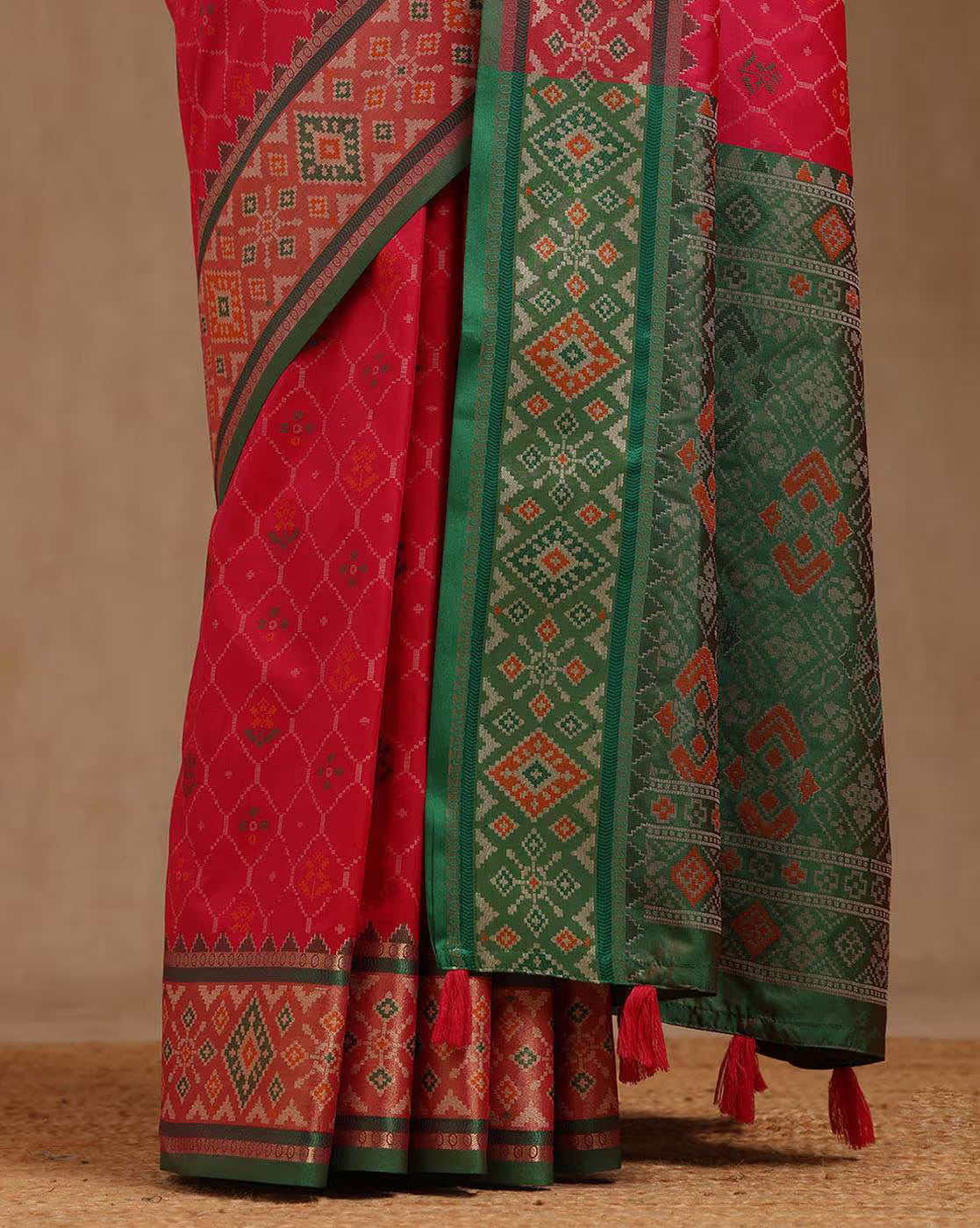 Elegant red and green linen saree from aromie, perfect for festive occasions in Canada