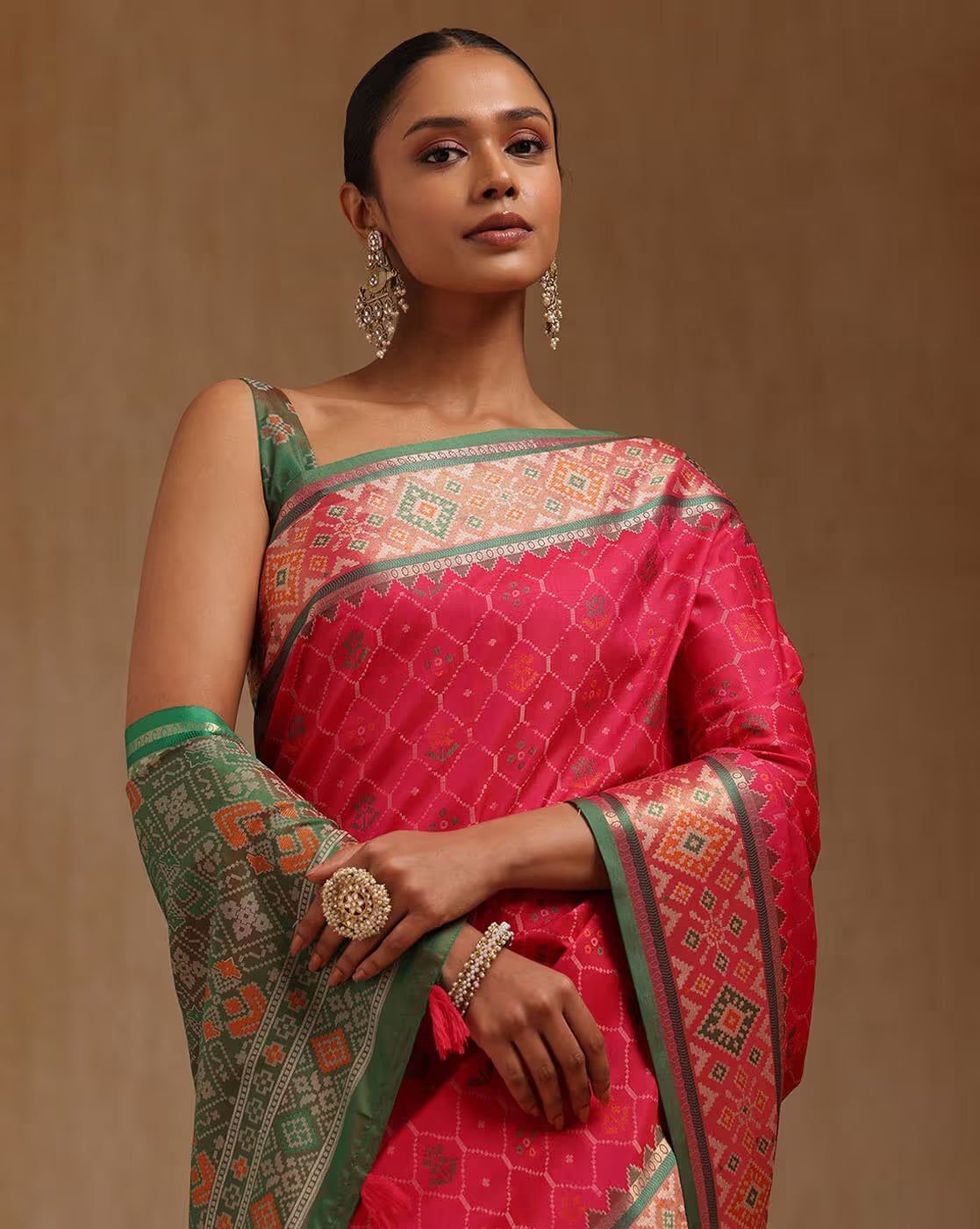 Aromie vibrant pink linen saree Canada with intricate patterns, perfect for festive occasions.
