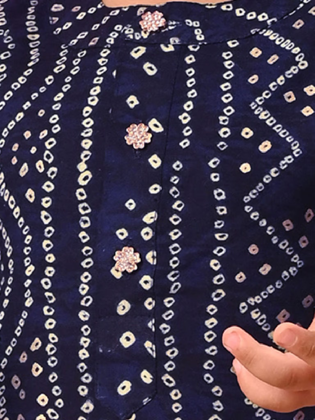 Navy blue bandhani print infant boys kurta patiala set with floral buttons and toddler hand detail