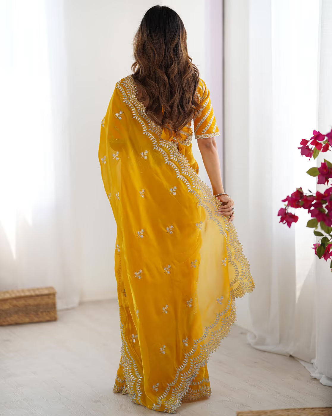 Elegant Madhu Bani silk saree online in vibrant yellow with intricate floral embroidery