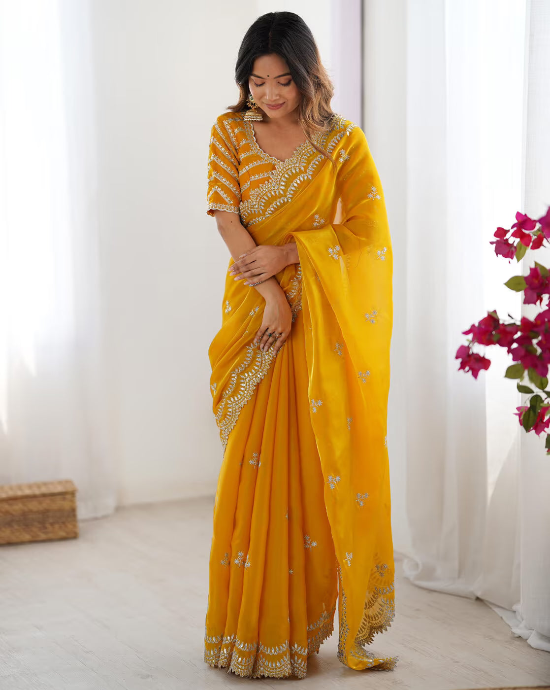 Elegant Madhu Bani silk saree online in vibrant yellow with intricate designs and light embellishments