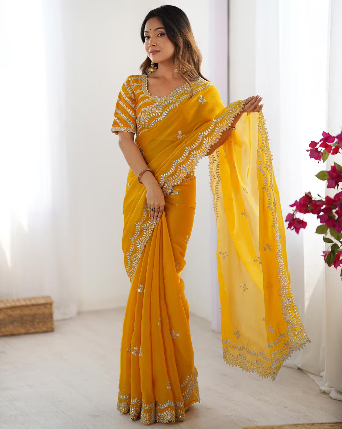 Beautiful yellow Madhu Bani silk saree online with intricate embroidery and border details