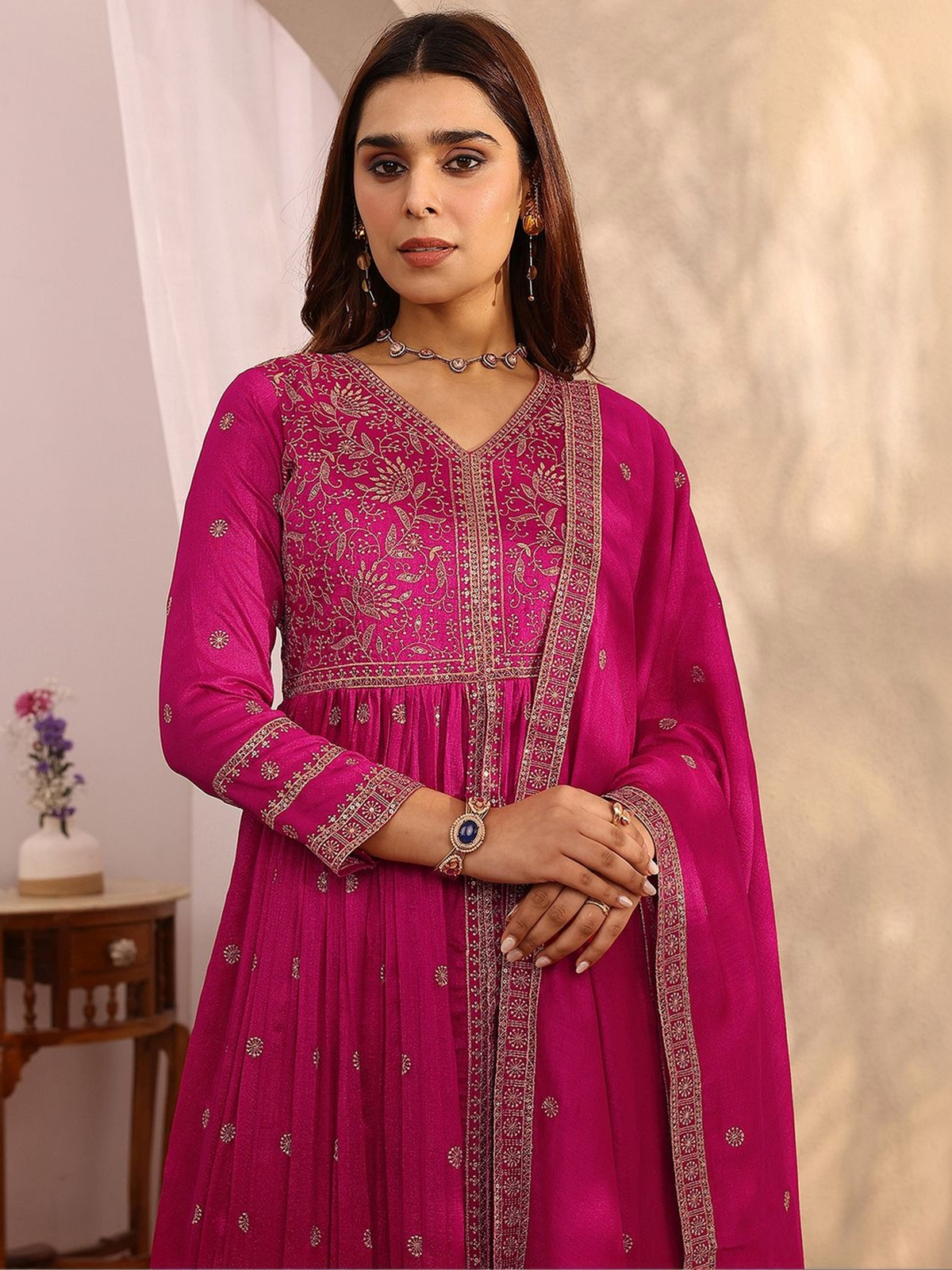 Aromie magenta Anarkali kurta palazzo set with intricate embroidery and a flowing design