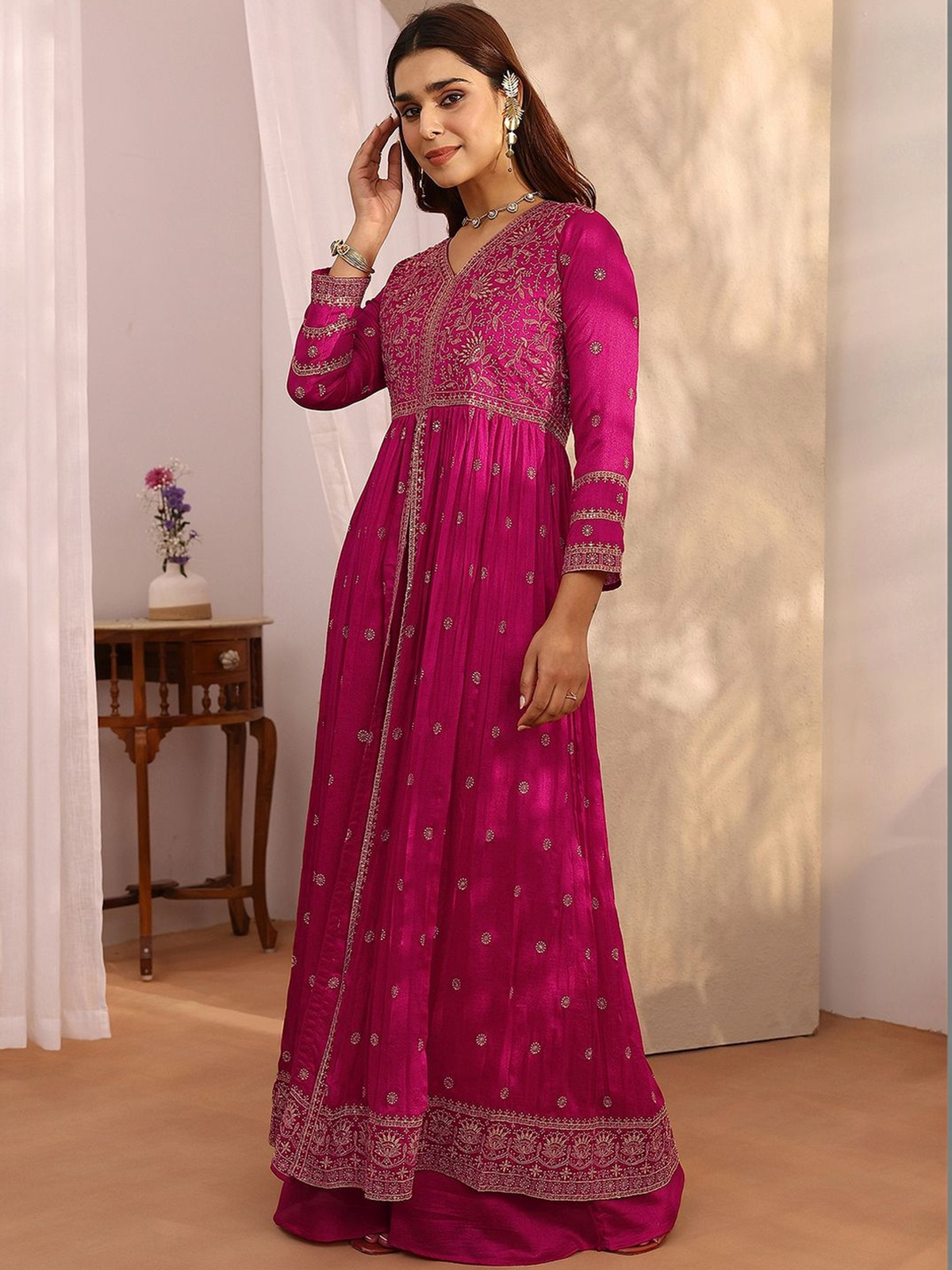Elegant magenta Anarkali kurta palazzo set with intricate embroidery and long sleeves