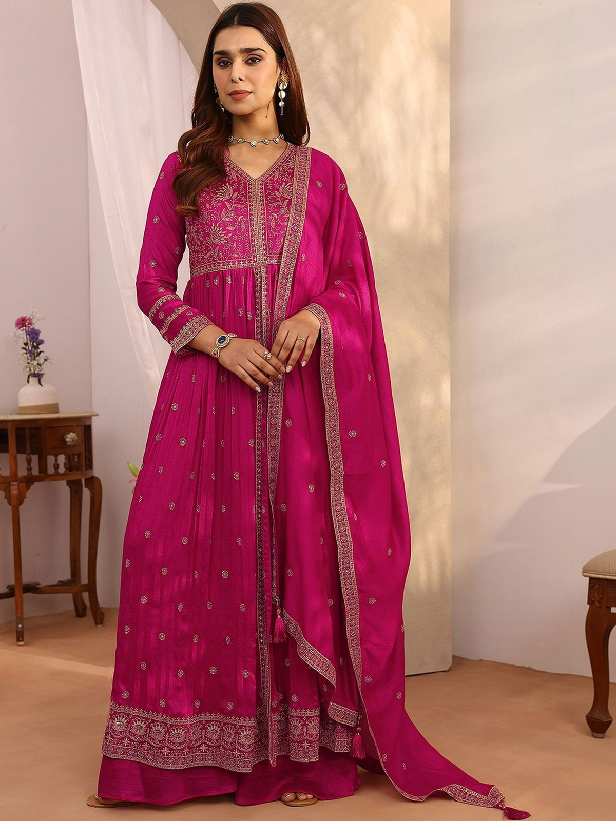 Magenta Anarkali kurta palazzo set with intricate embroidery and matching dupatta for festive occasions