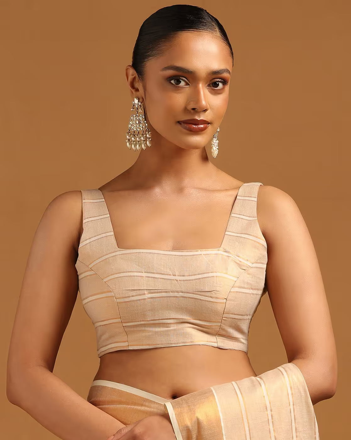 Front view of a model wearing a Magenta Georgette Saree for Women Canada with traditional design, perfect for festive occasions.