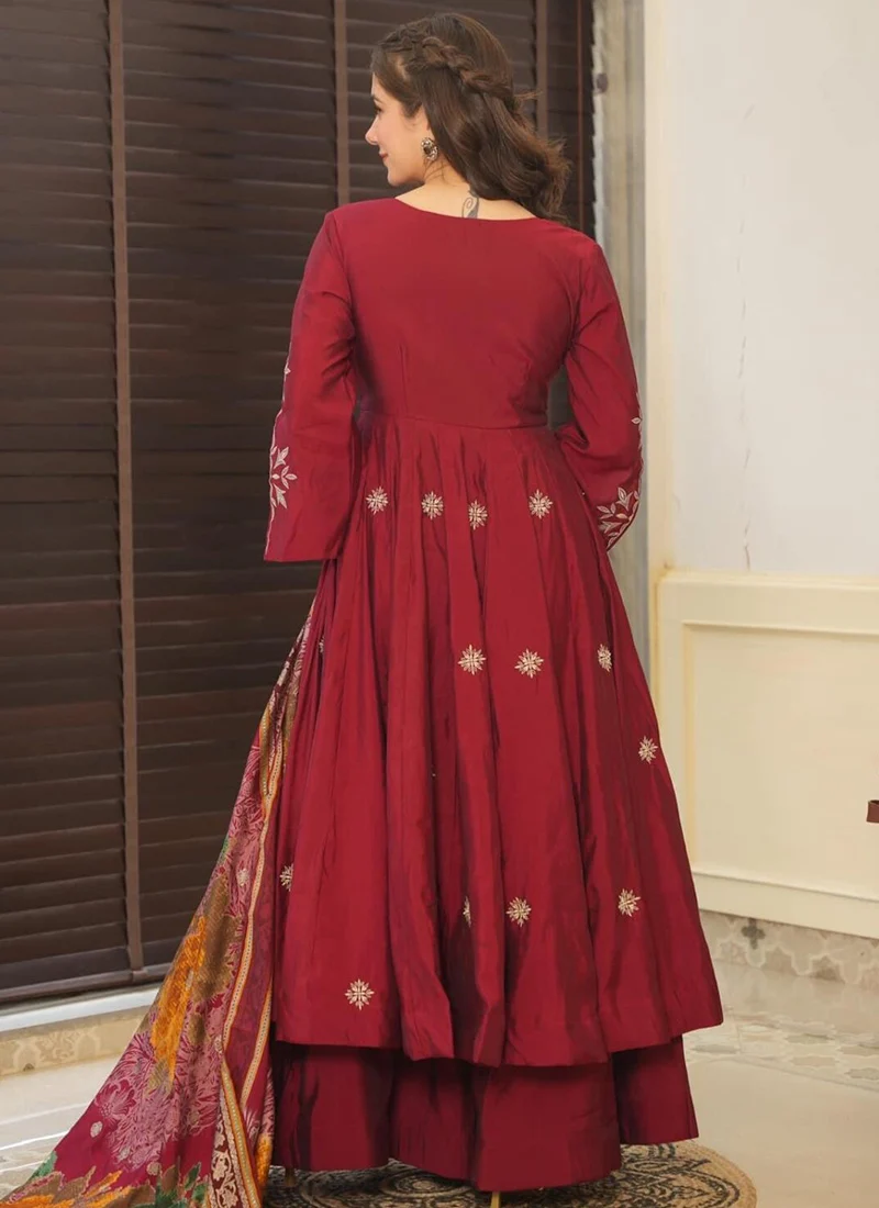 Elegant maroon anarkali dress online with intricate embroidery and flowing design from Aromie