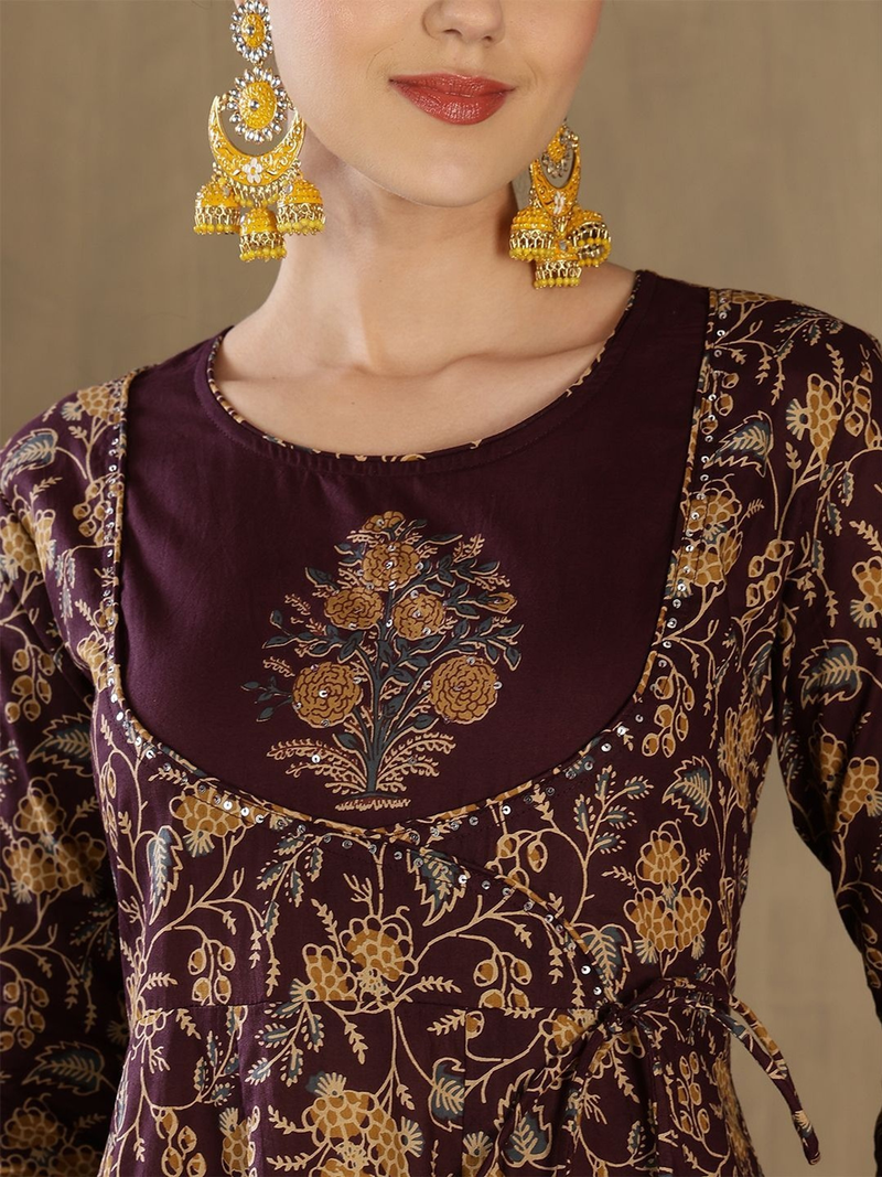 Detailed view of a maroon Anarkali kurta set Canada with floral embroidery, perfect for festive occasions.