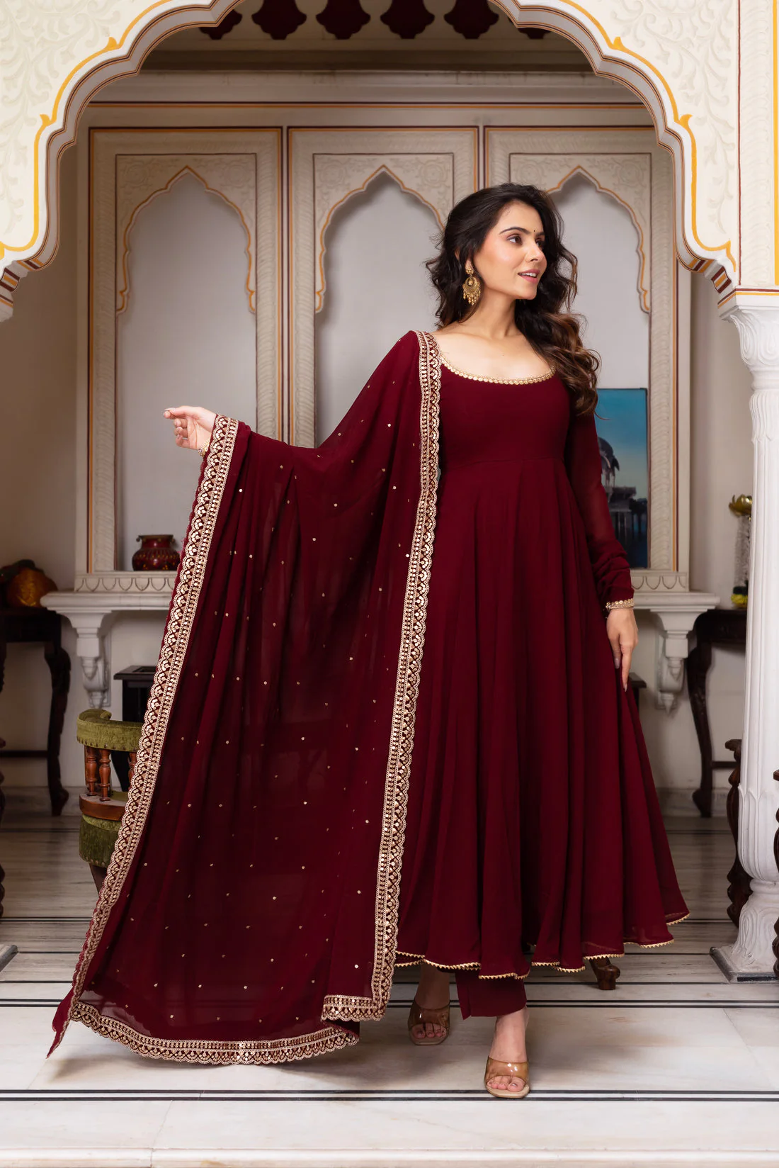 Maroon Anarkali suit set Canada featuring intricate detailing, suitable for festive occasions, shown in a front view.