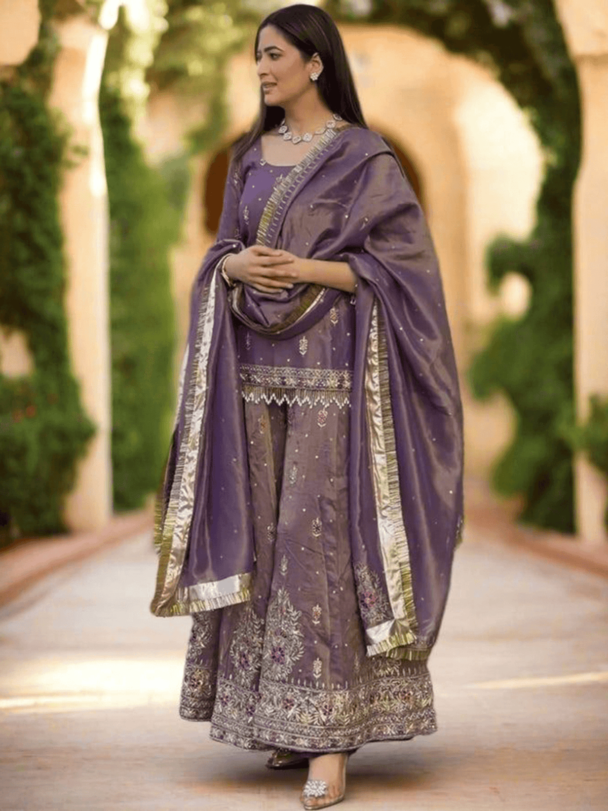 Elegant maroon embroidered kurta set featuring intricate embroidery and a beautiful design