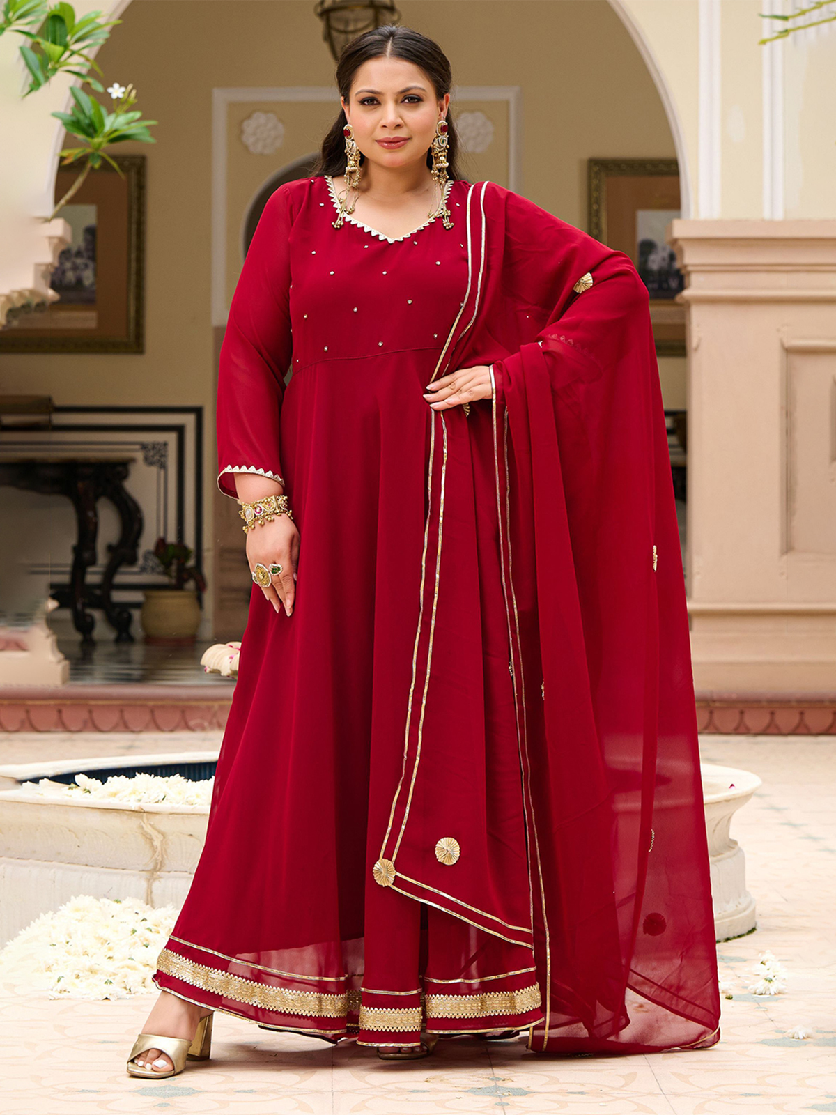 Elegant maroon zari anarkali kurta with dupatta featuring exquisite detailing and a flattering silhouette