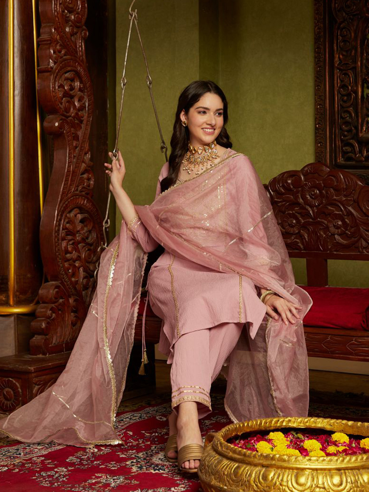 Mauve embroidered kurta set in lightweight fabric with detailed embroidery, perfect for festive occasions