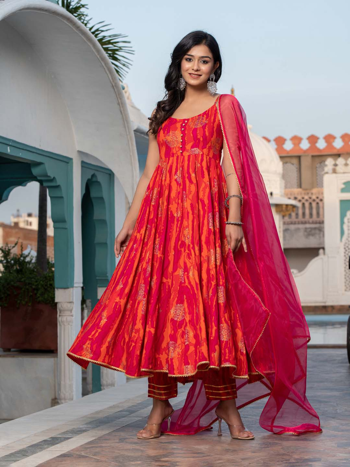 Aromie mauve floral kurta set featuring a vibrant dress and coordinating dupatta for stylish occasions