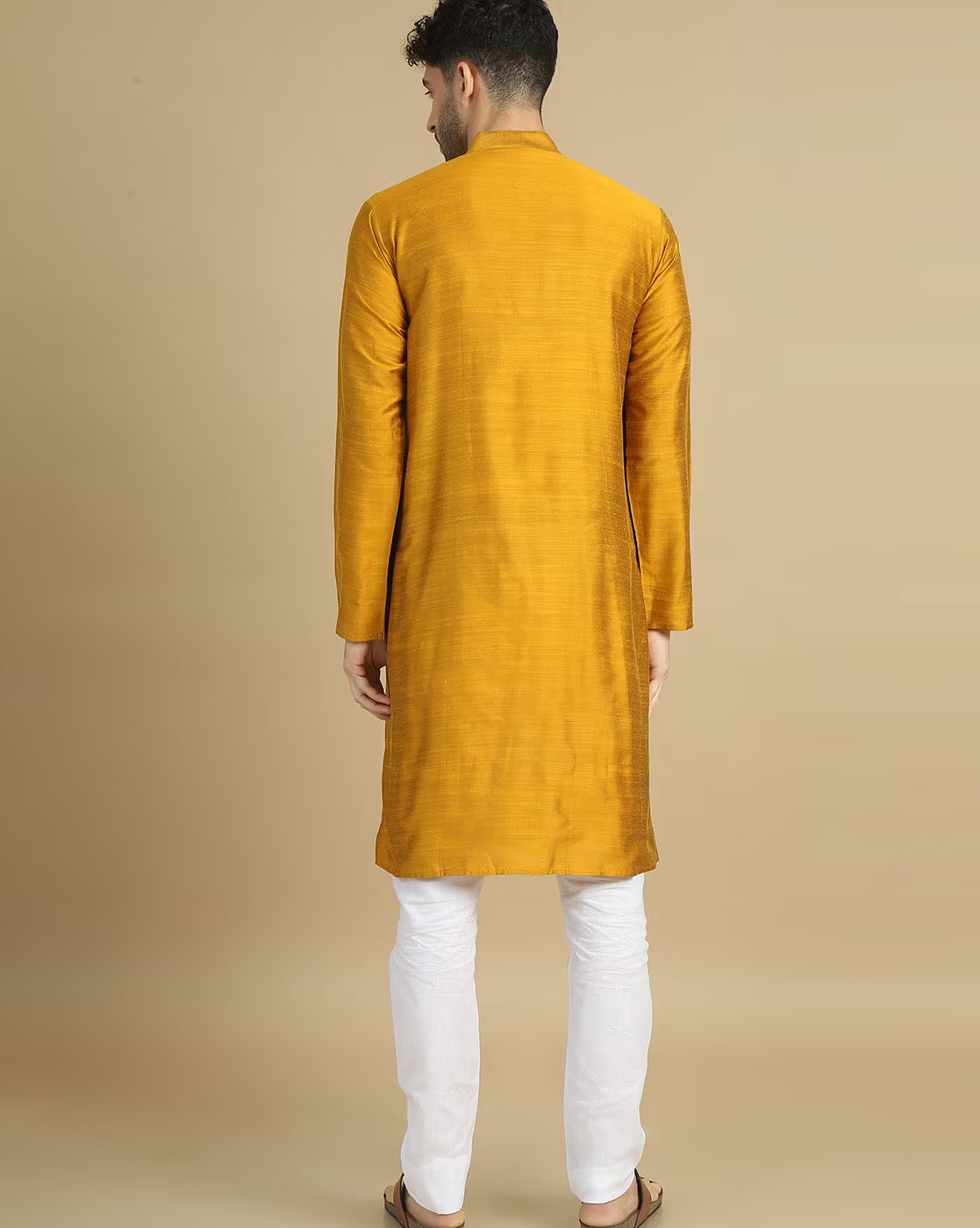 Stylish men's cotton kurta pyjama set in mustard yellow, perfect for festive occasions