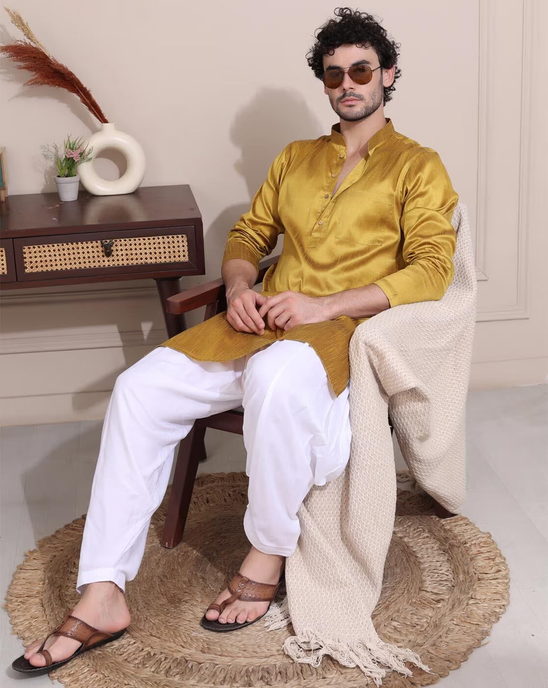 Stylish men's mustard kurta Canada paired with white pants for a casual look