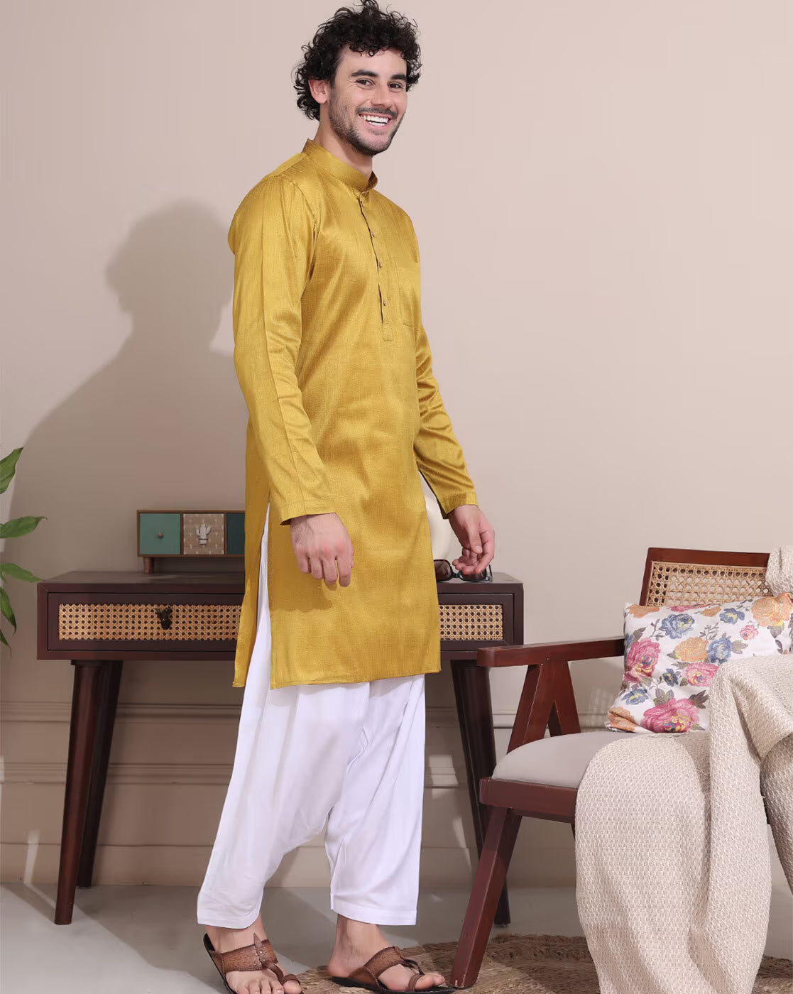 Stylish men's mustard kurta Canada paired with white trousers for a smart casual look