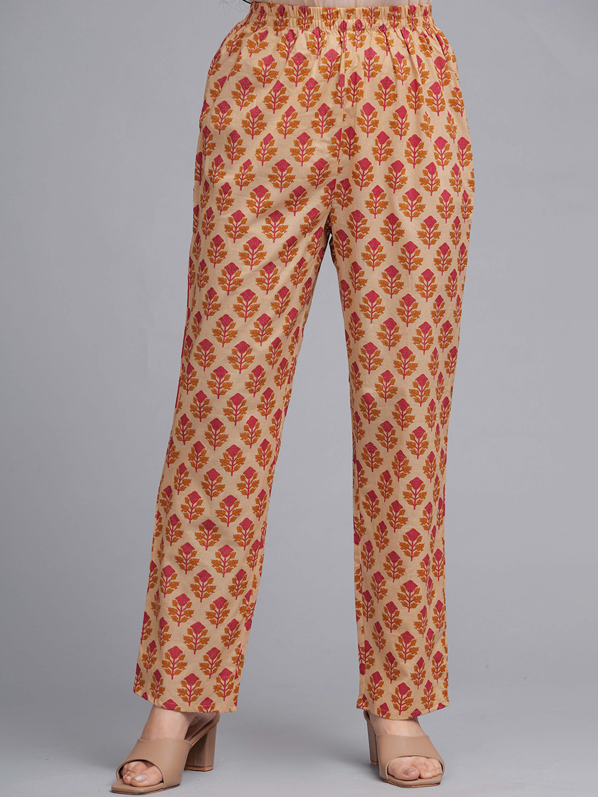 Front view of mustard yellow anarkali kurta set featuring floral pattern and comfortable fabric, ideal for casual outings