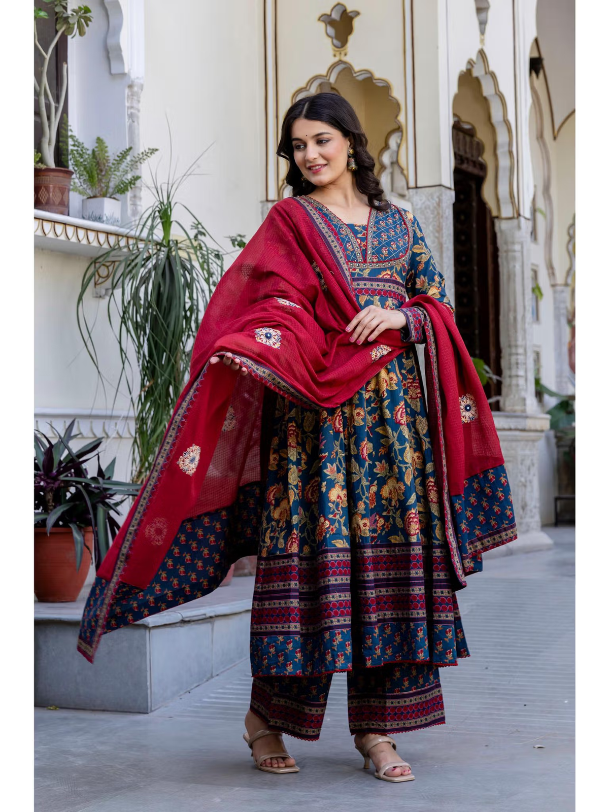 Elegant navy blue anarkali kurta set Canada featuring floral patterns and a stylish red dupatta