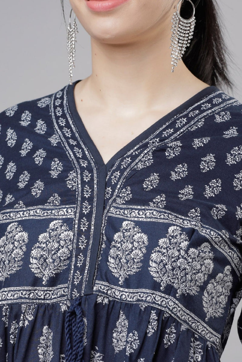 Detail of Navy Blue Cotton Maxi Dress featuring floral patterns and a V-neck design