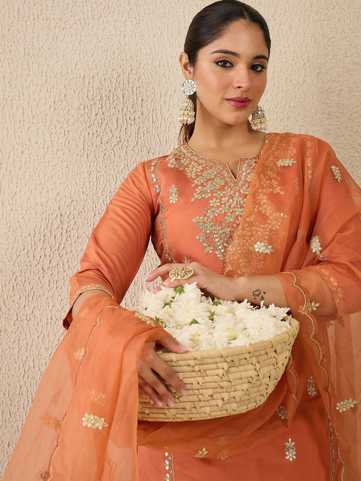 Elegant Navy Blue Cotton Maxi Dress styled with traditional accessories and flowers for a festive look