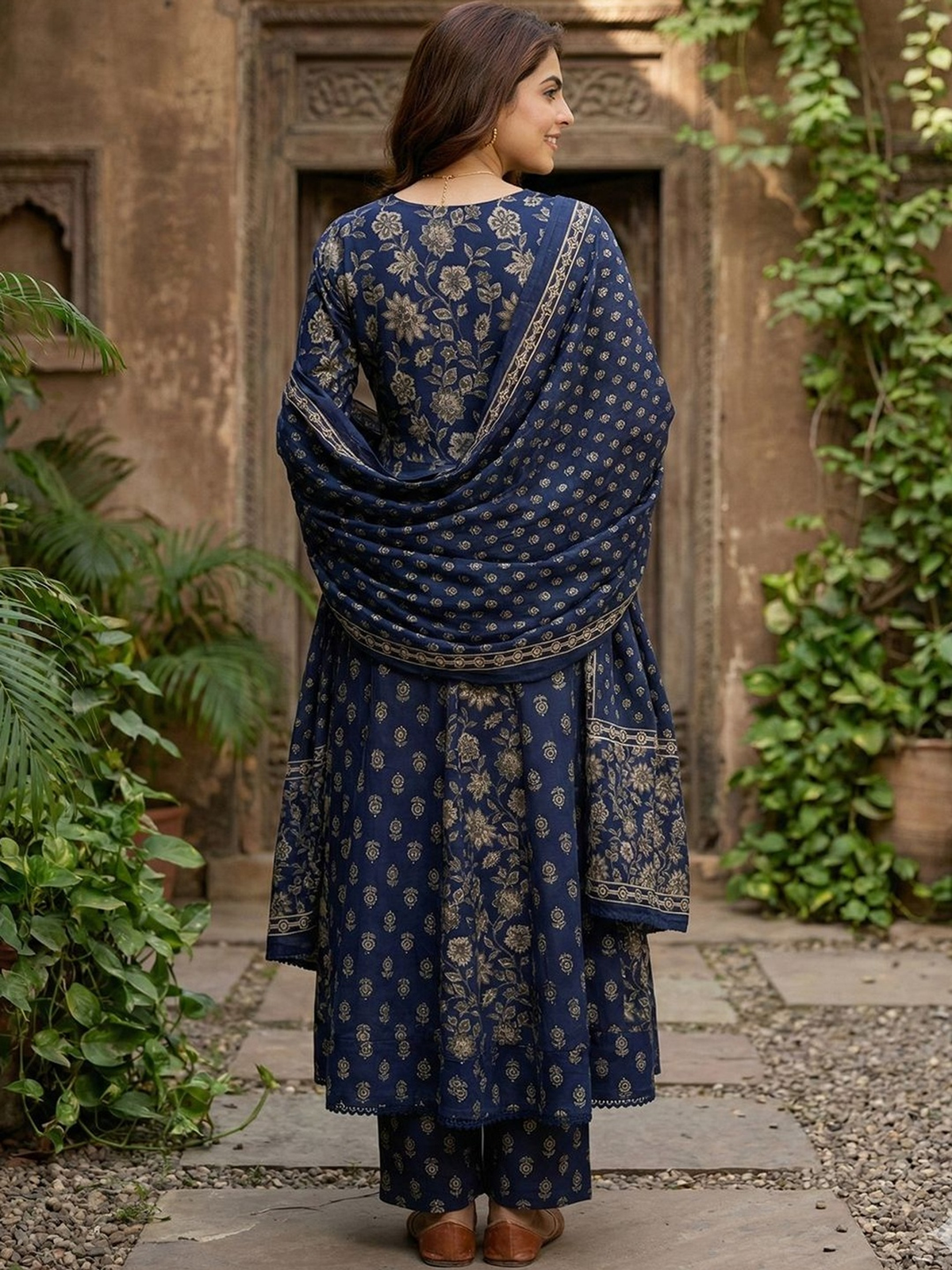 Navy blue embroidered anarkali set Canada made of lightweight fabric, perfect for festive occasions, shown from the back