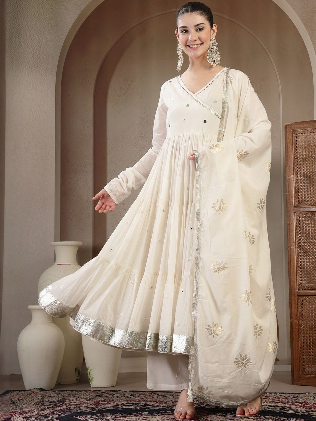 Off white Anarkali kurta set Canada featuring elegant embroidery and a flowing design