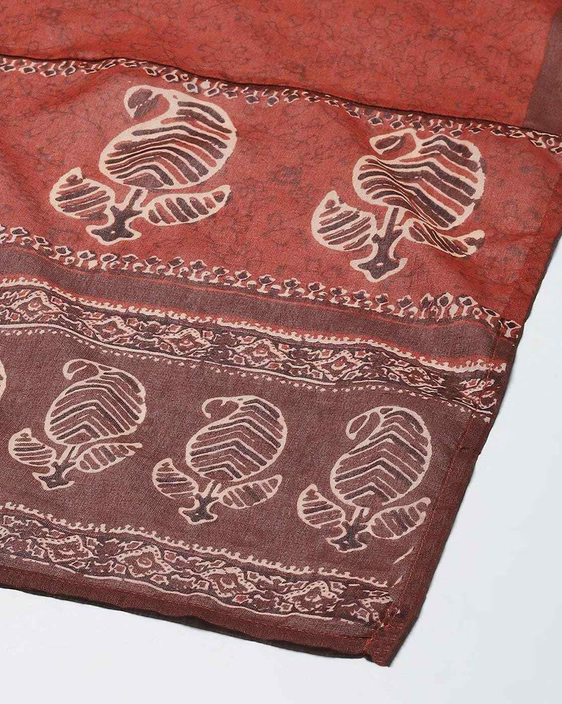 Orange Geometric Angrakha Anarkali with intricate patterns and designs by Aromie