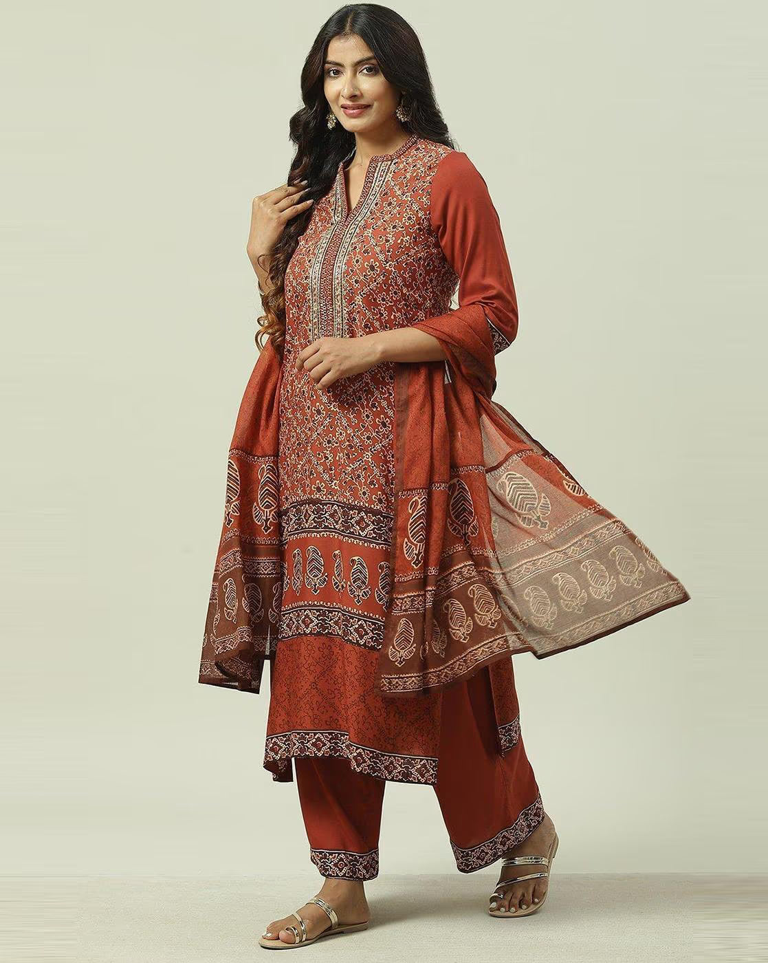 Orange Geometric Angrakha Anarkali by Aromie featuring intricate patterns and a flowing silhouette