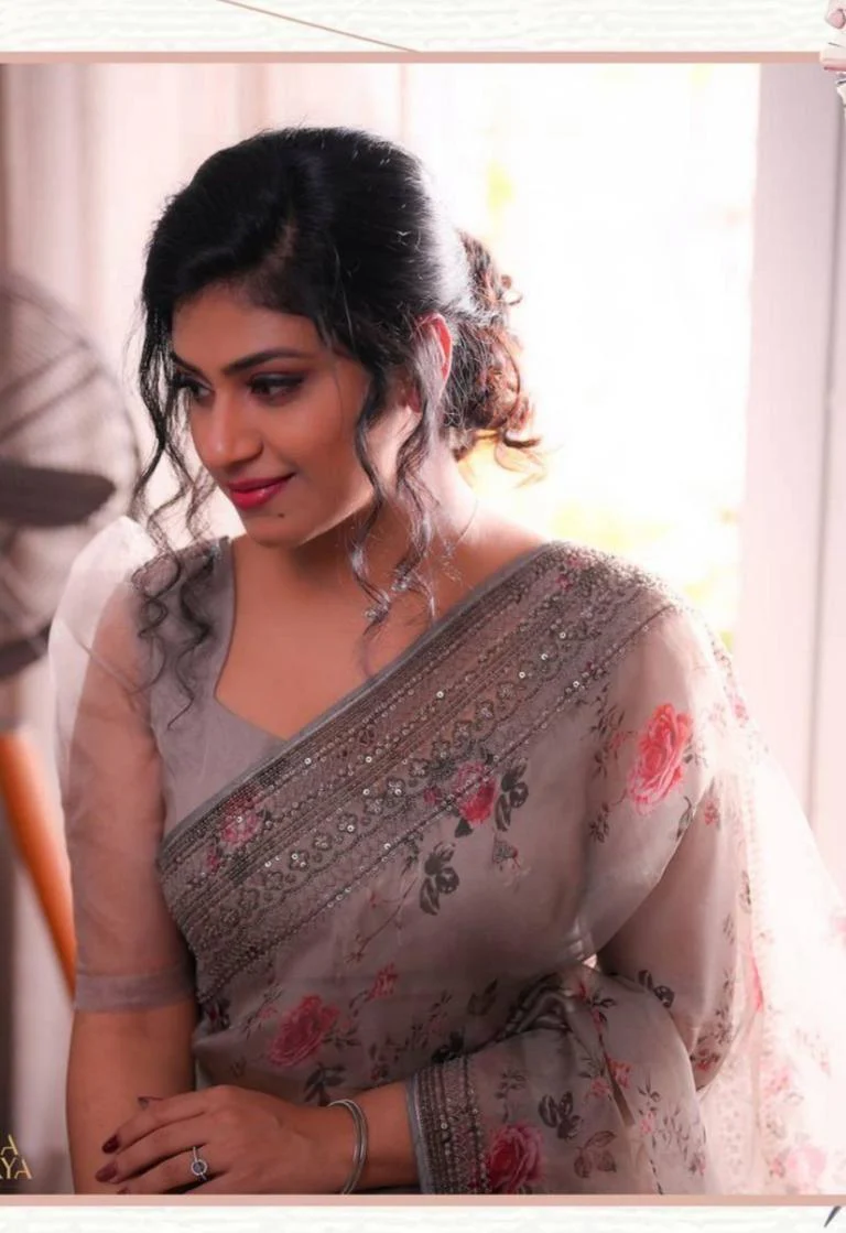 Elegant organza embroidered saree in grey with floral design, perfect for formal events and weddings