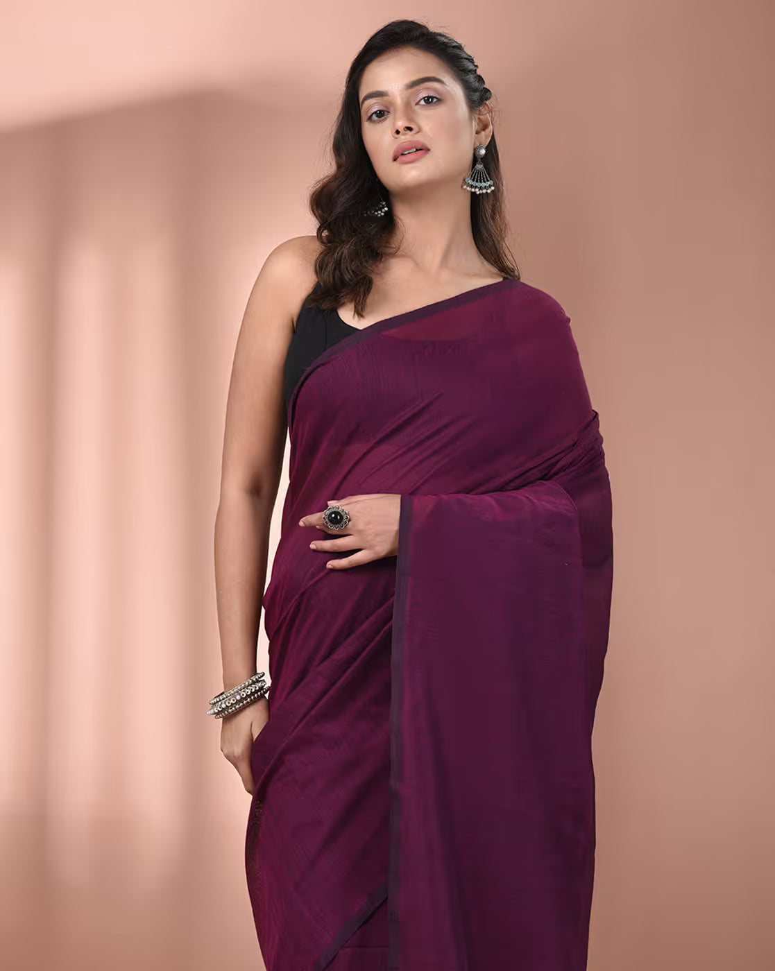 Front view of a deep plum organza saree with stone work Canada, ideal for weddings and special occasions.