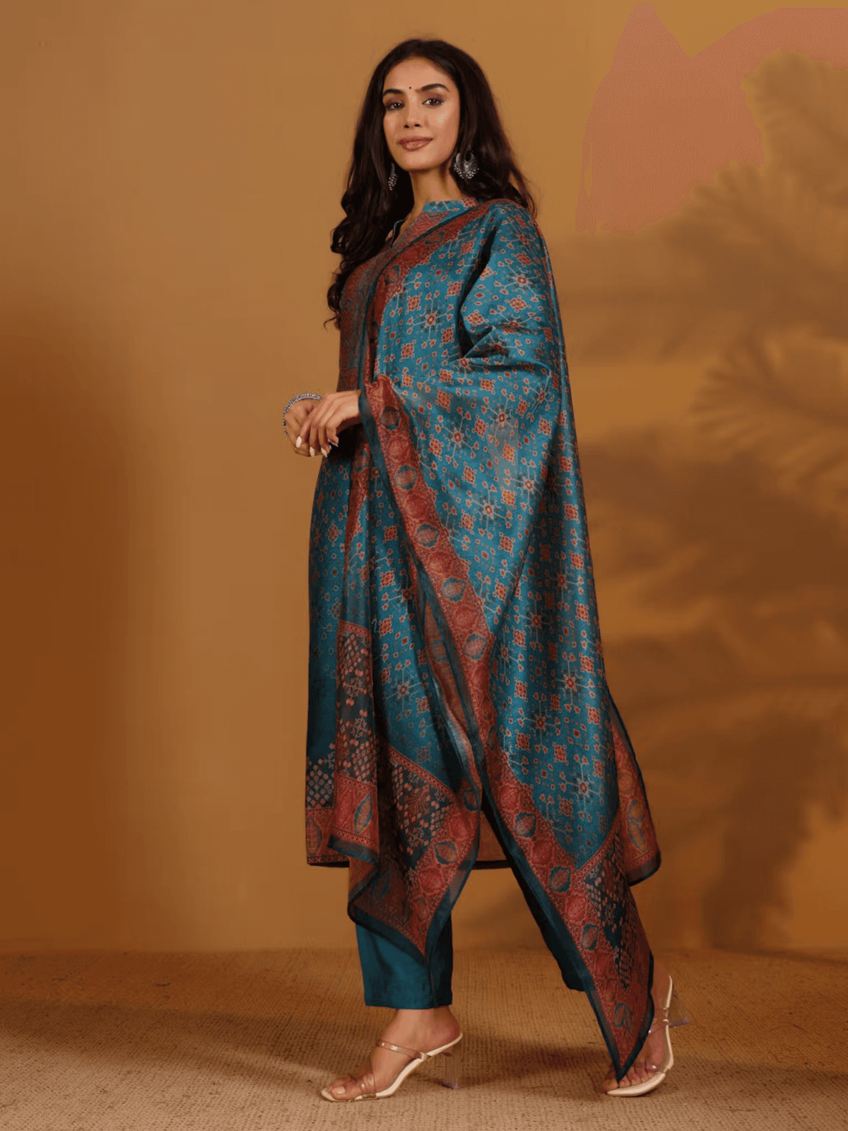 Aromie Patola print kurta set Canada featuring a blue and brown design with elegant draping