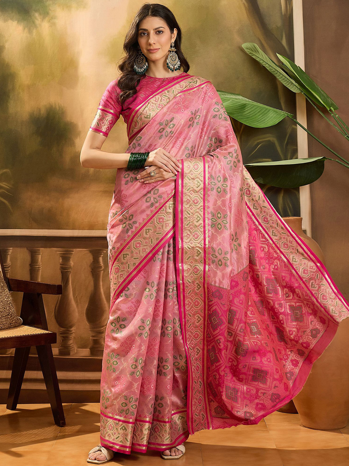 Elegant pink Patola saree from aromie in soft fabric, perfect for weddings and festive occasions in Canada.