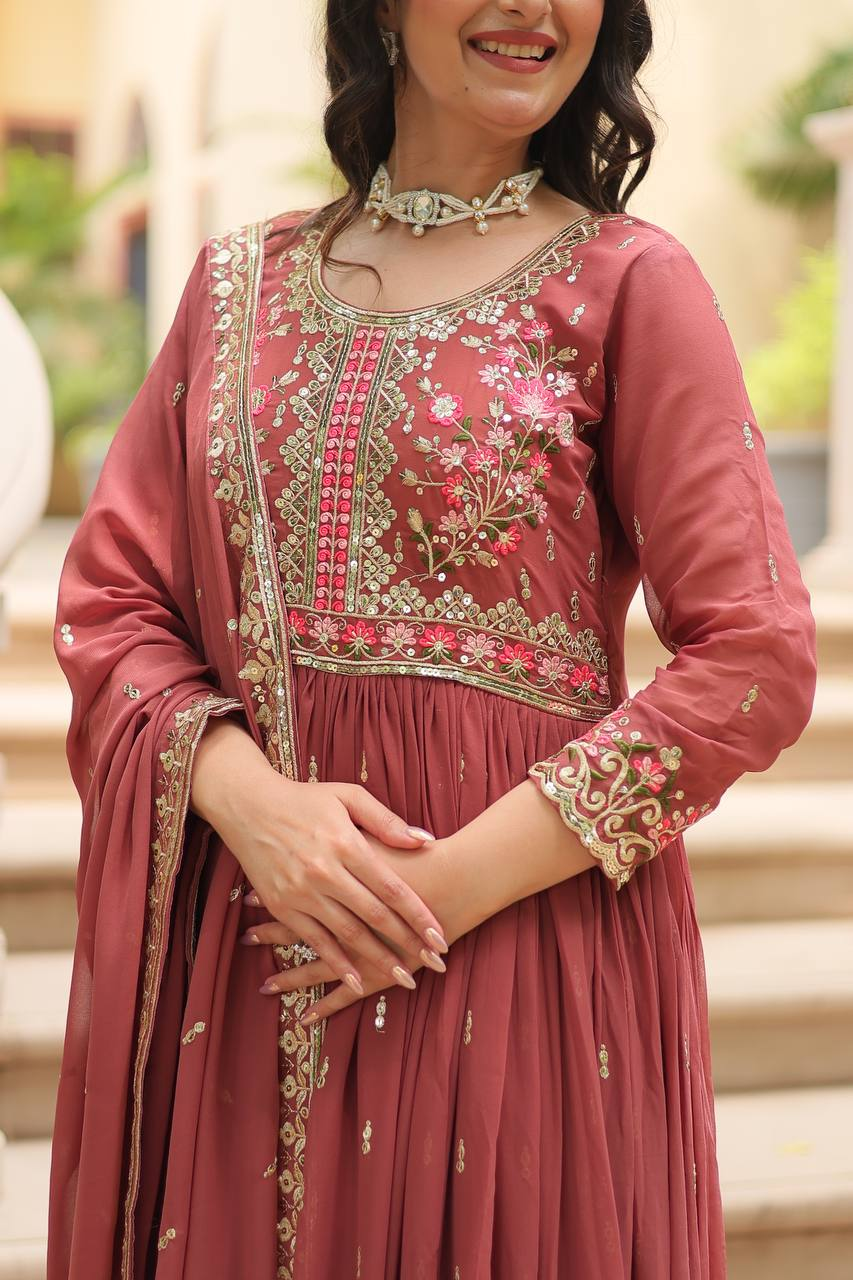 Peach designer sharara suit set in embroidered fabric, front view, perfect for weddings or festive occasions.