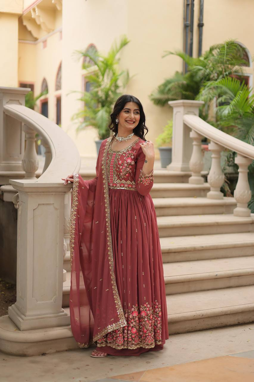 Peach designer sharara suit set featuring floral embroidery, ideal for weddings and festive occasions