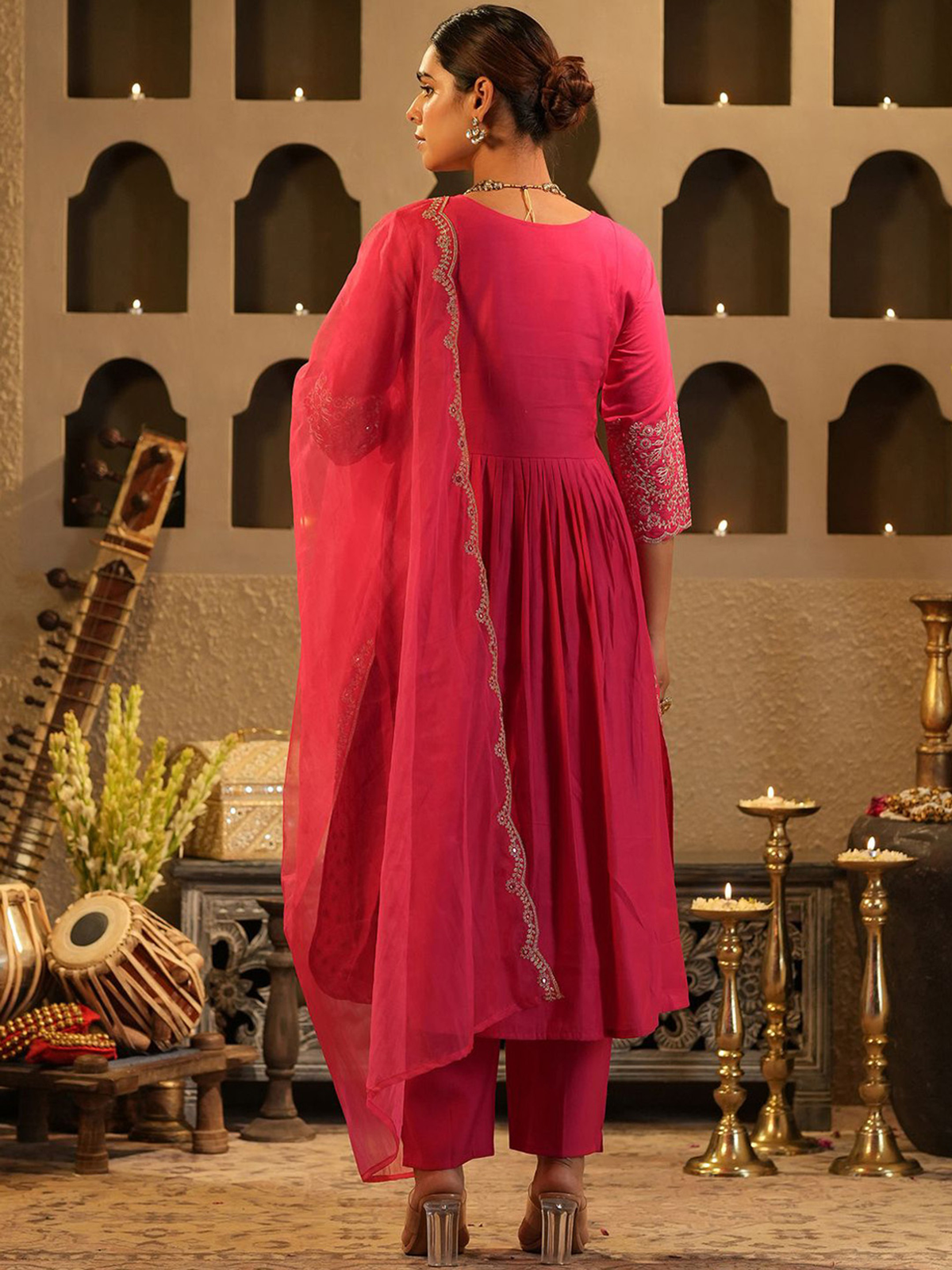 Elegant Pink Banarasi Anarkali set showcasing a flowy kurta and matching pants with a stylish dupatta