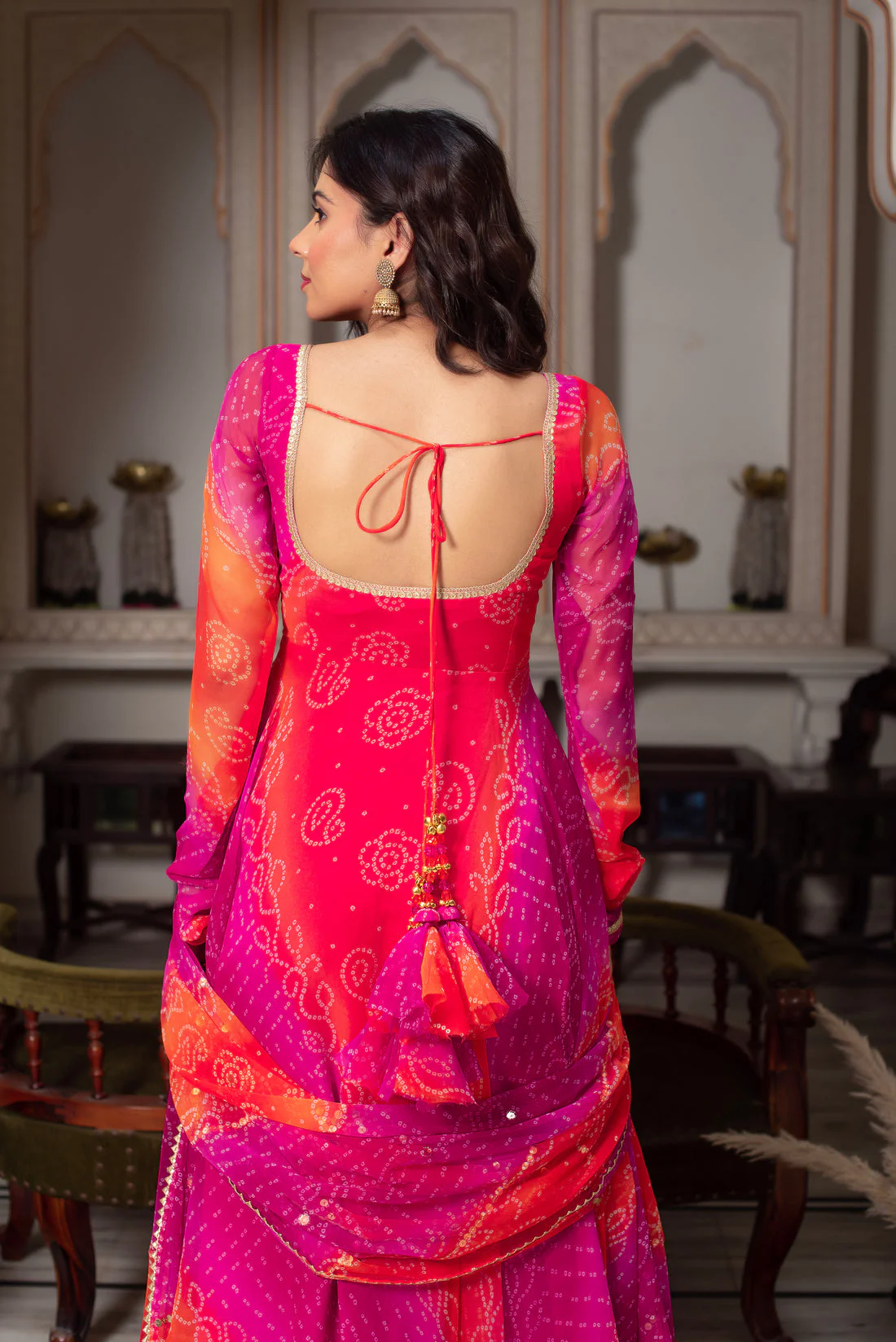 Back view of Pink Bandhani Anarkali suit Canada with intricate patterns, perfect for festive occasions