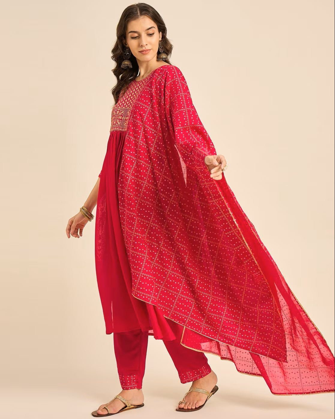 Elegant pink embroidered kurta set with stylish drape for festive occasions and everyday wear
