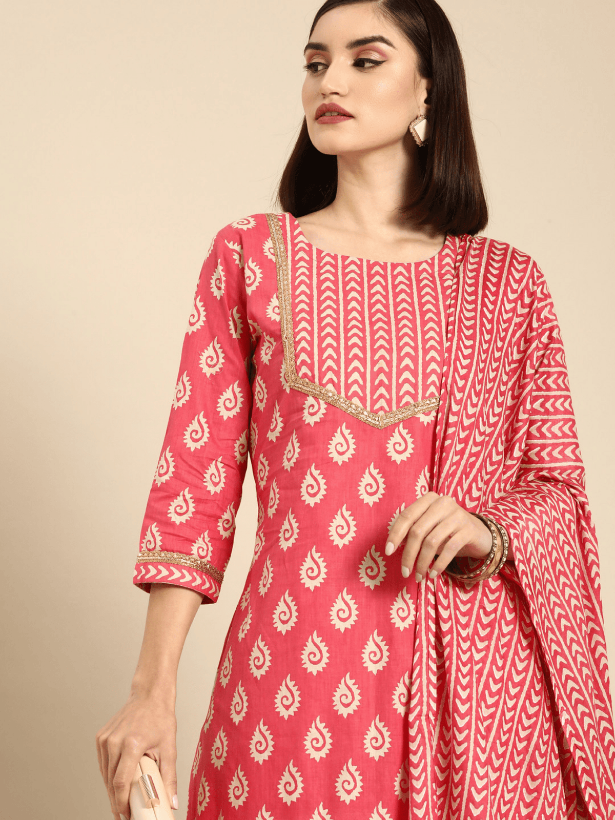 Pink ethnic kurta set by Aromie featuring traditional patterns and elegant design for festive occasions