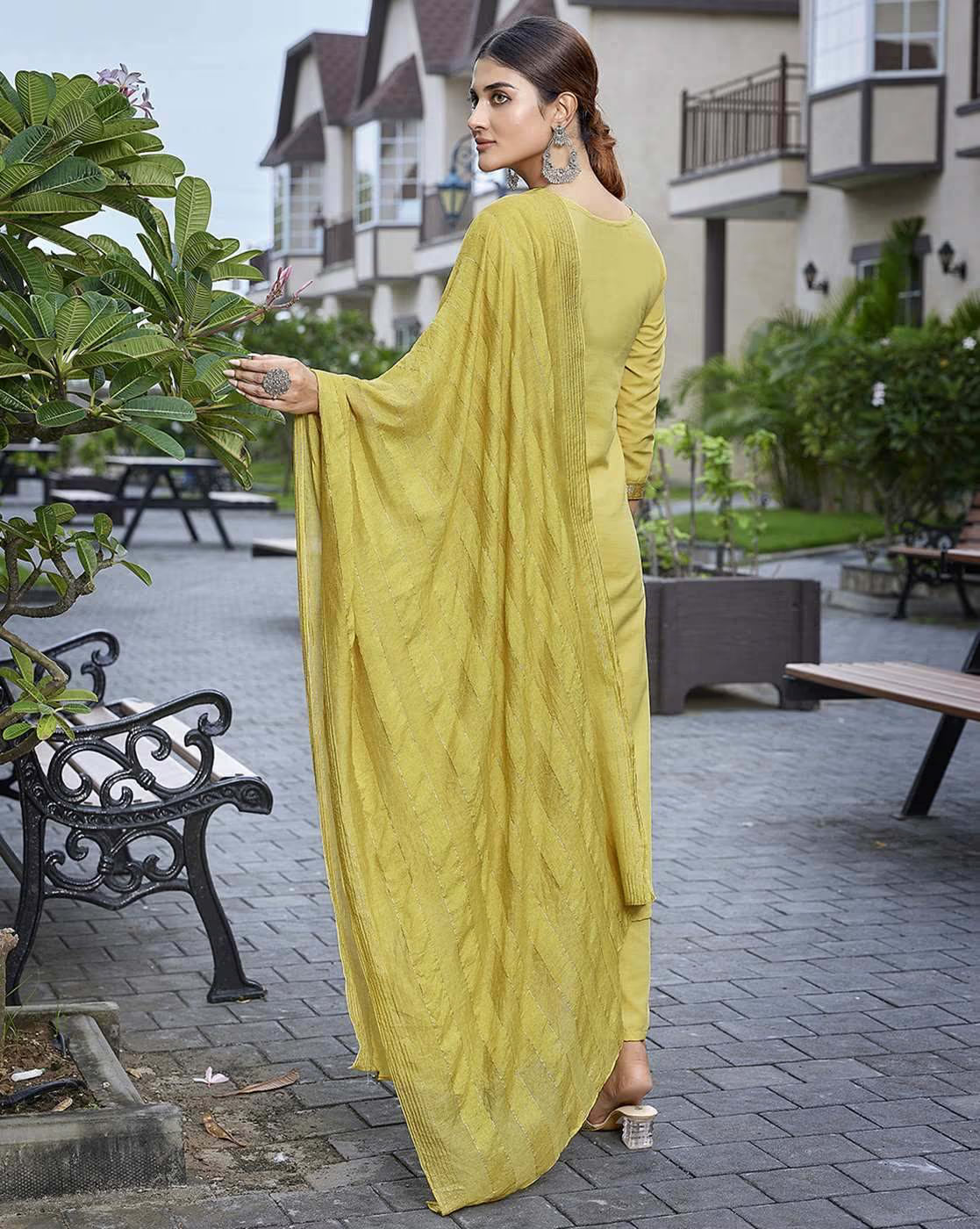 Elegant three piece Kurtha set in yellow with flowing dupatta for festive occasions from aromie