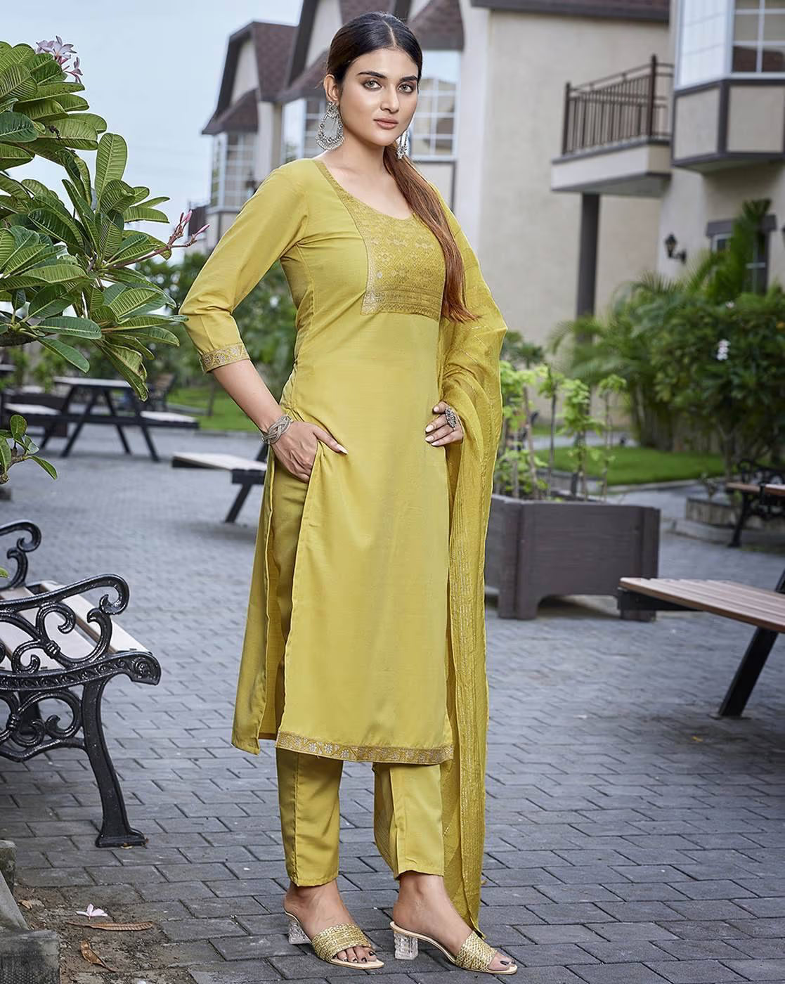 Elegant yellow three piece Kurtha set featuring a long tunic and matching bottoms