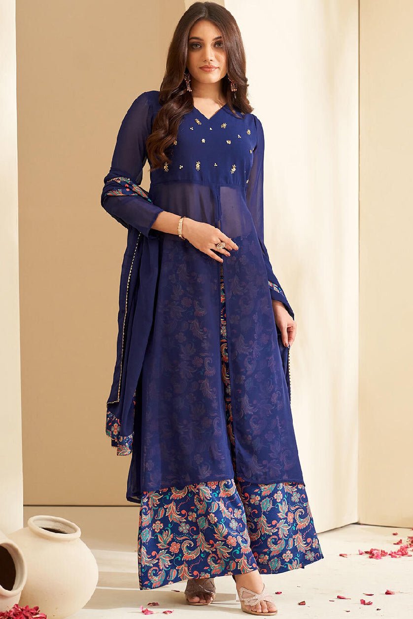 Elegant three piece Polyester Muslin Kurta Set in navy blue with floral embroidery and matching bottom