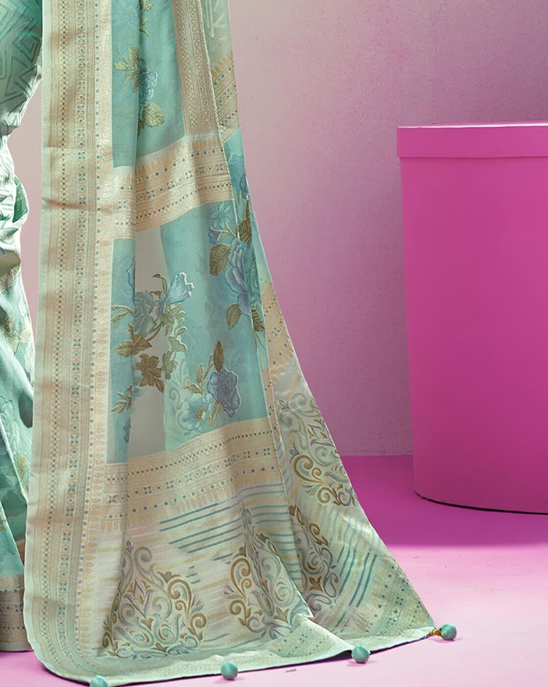 Aromie printed cotton casual saree in light blue with floral patterns and decorative border detailing