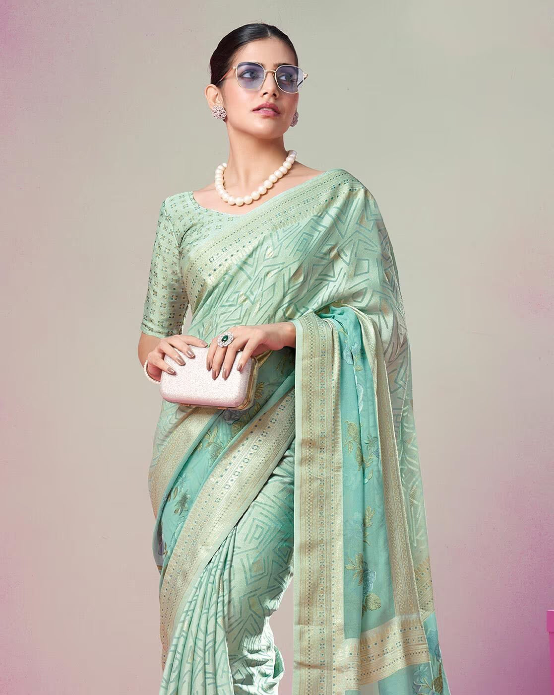 Elegant printed cotton casual saree in light green with geometric patterns, perfect for everyday wear