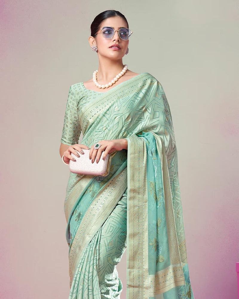 Elegant printed cotton casual saree in light green with geometric patterns, perfect for everyday wear