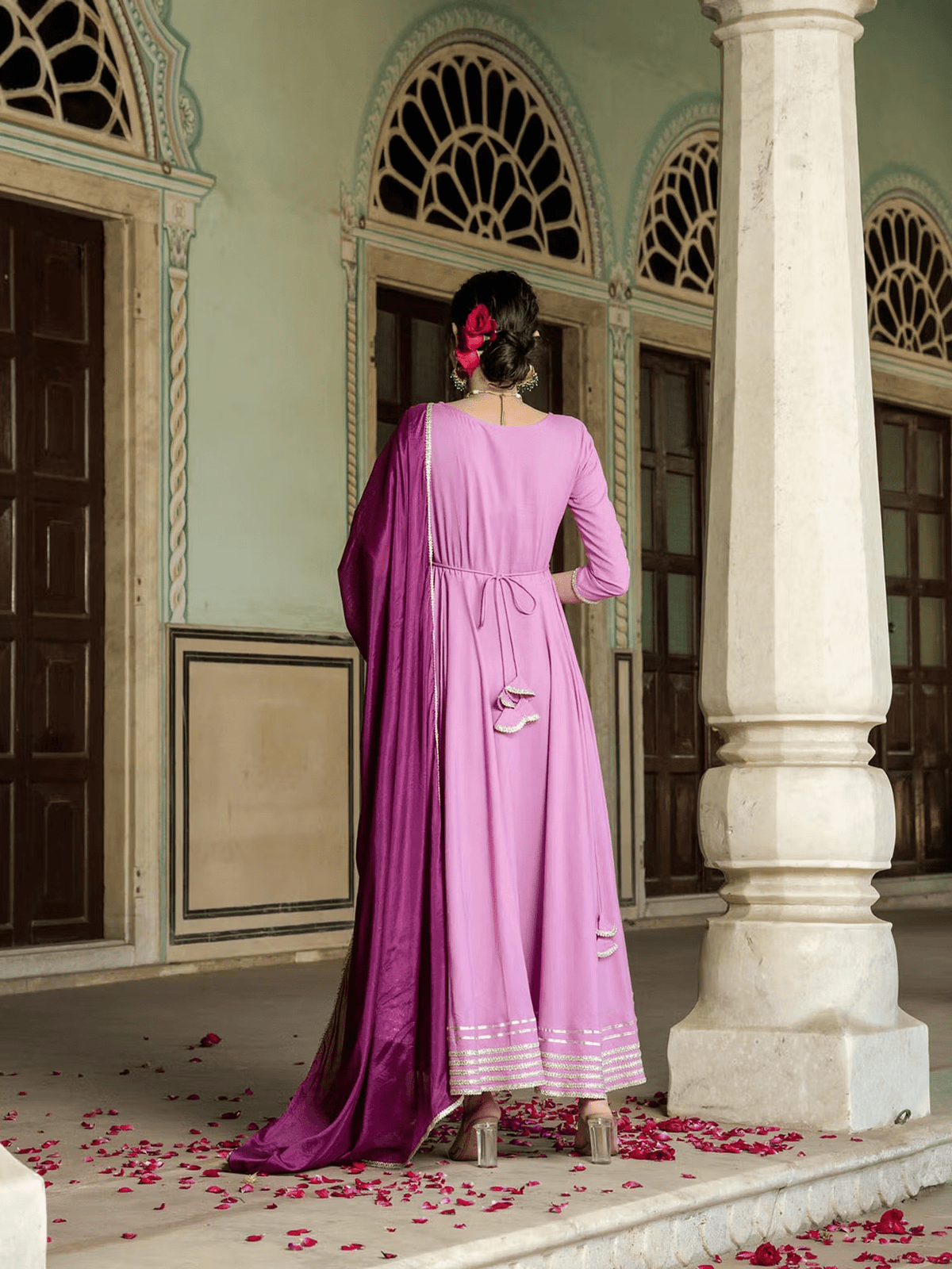 Elegant Purple Anarkali Suit Canada featuring a flowing silhouette and intricate details in a vibrant hue
