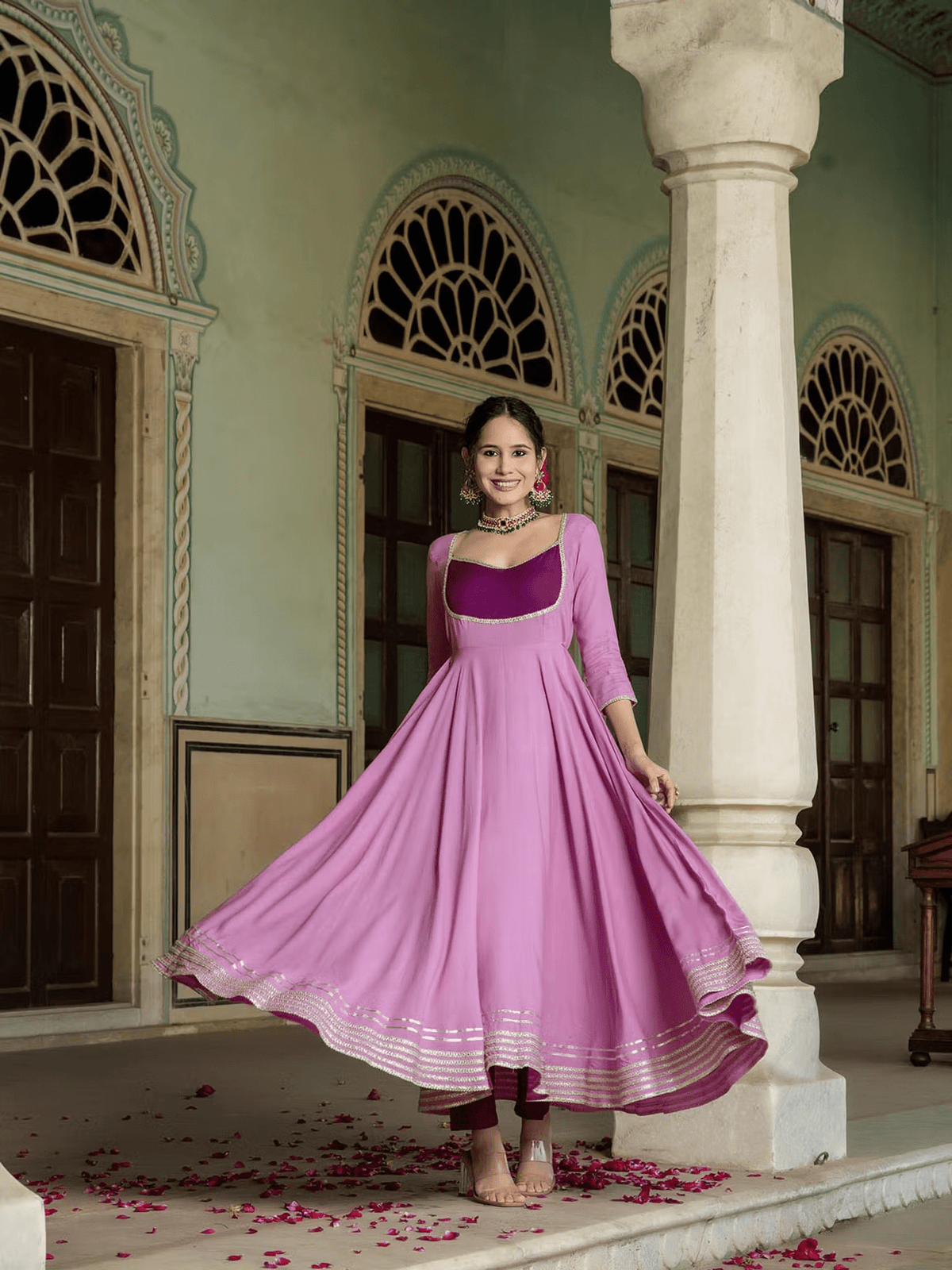 Elegant Purple Anarkali Suit Canada featuring a flowing silhouette and detailed accents for festive wear